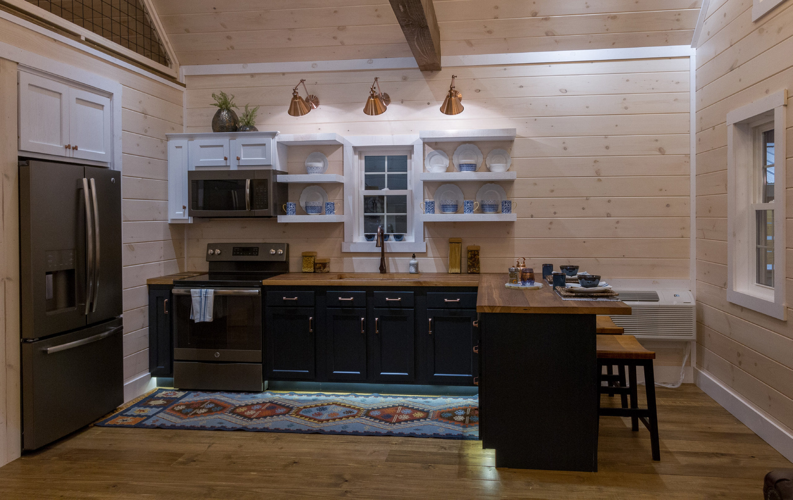 Kitchen and Dining Area of Rocky Ridge Cabin by Weaver Barns of Sugarcreek, Ohio. Amish Country Cabin Builders in Central Ohio.